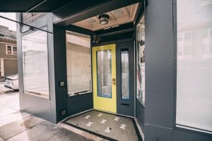 Glass entrance door installed by Union Door