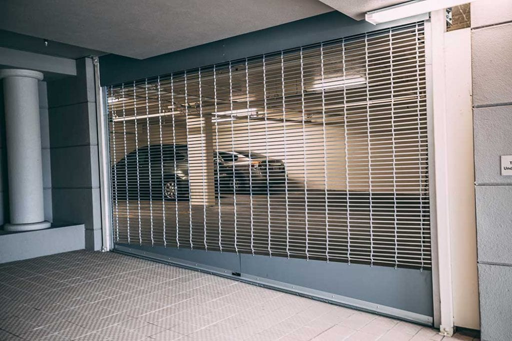 Custom slanted rolling gate to parking garage